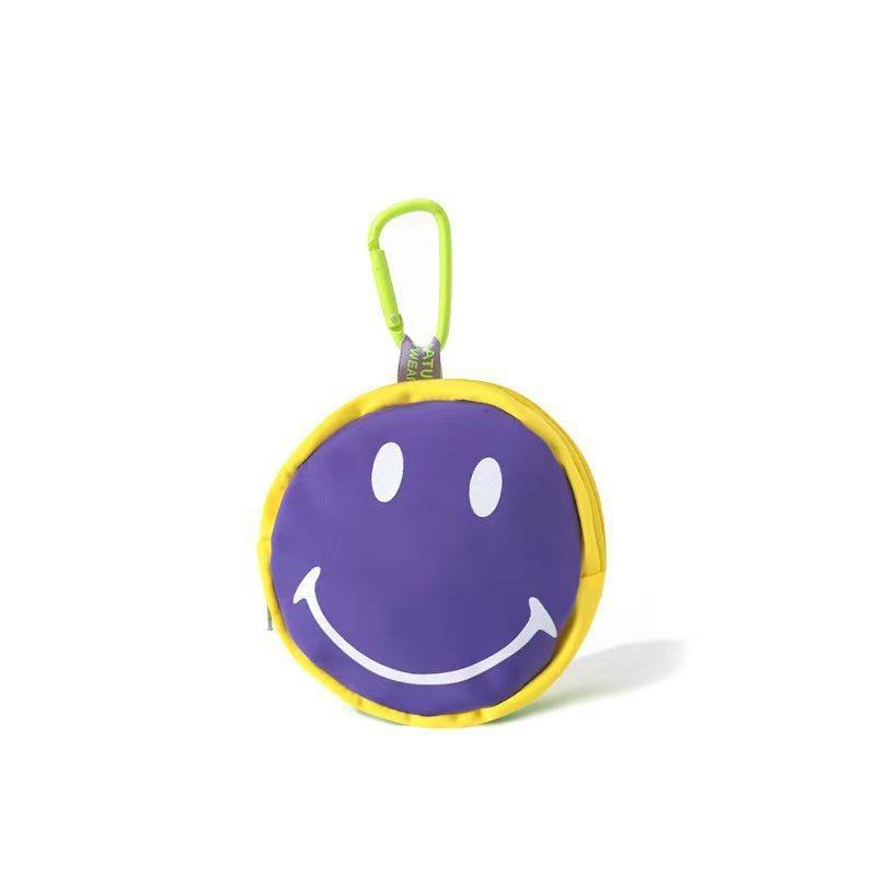 

New cartoon candy color smiley face bag mini solid color key bag pendant change storage bag universal men and women