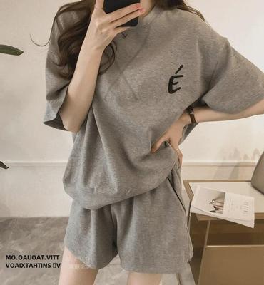 Women's Summer 2023 Loose-Fit Two-Piece Suit: Fashionable Short-Sleeve Top & Shorts for Casual Running or Student Style.