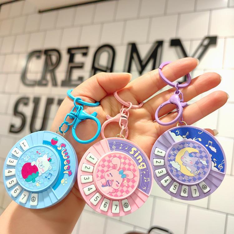 Mini Guitar Keychain with DJ Scratch Sound - Fun Musical Schoolbag Toy for Kids