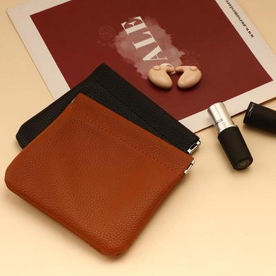 Portable Lychee Pattern Mini Storage Bag: Automatic Closure for Cables, Earphones, Lipsticks & Coins.
