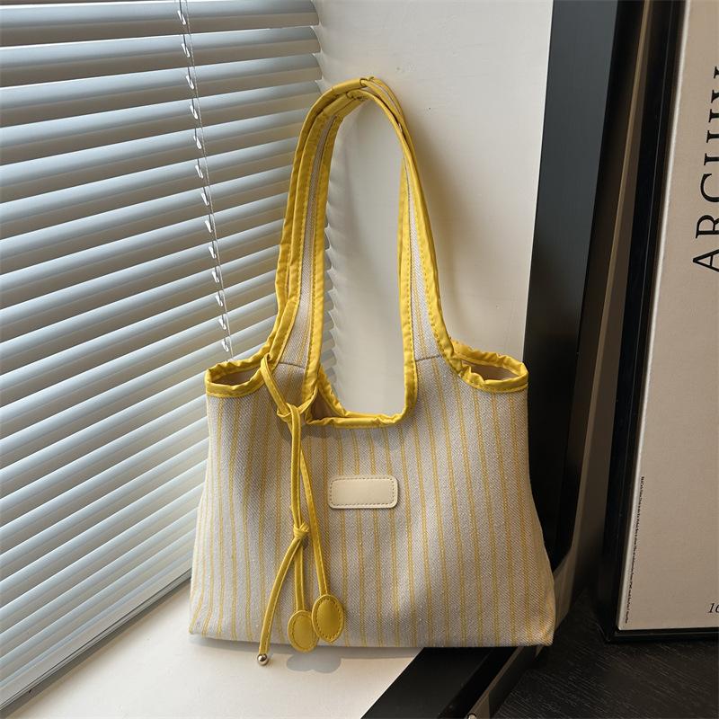 2025 New Niche Shoulder Bag Striped Simple Tote Bag Simple Versatile Portable Color Matching Armpit Bag