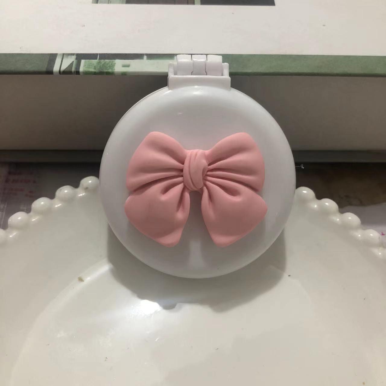 

Портативная мини-складная расческа с воздушной подушкой и милым дизайном с бантиком