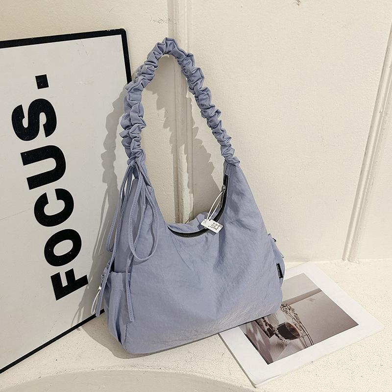 

2025 summer new fashion pleated messenger bag trend simple high value shoulder bag women s casual tote bag синий