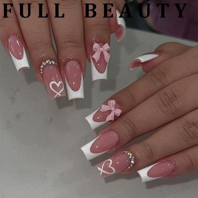 24 pezzi French Tip Press On Nails con ciondoli Unghie finte medie French bianche Unghie Press Ons Fiocco carino Stick On Nails lunghe