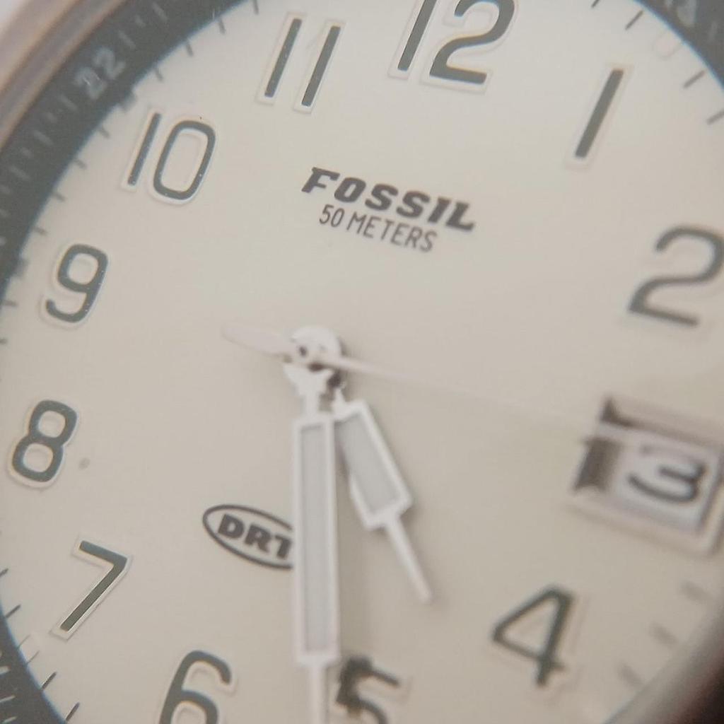 Used FOSSIL DRT quartz watch