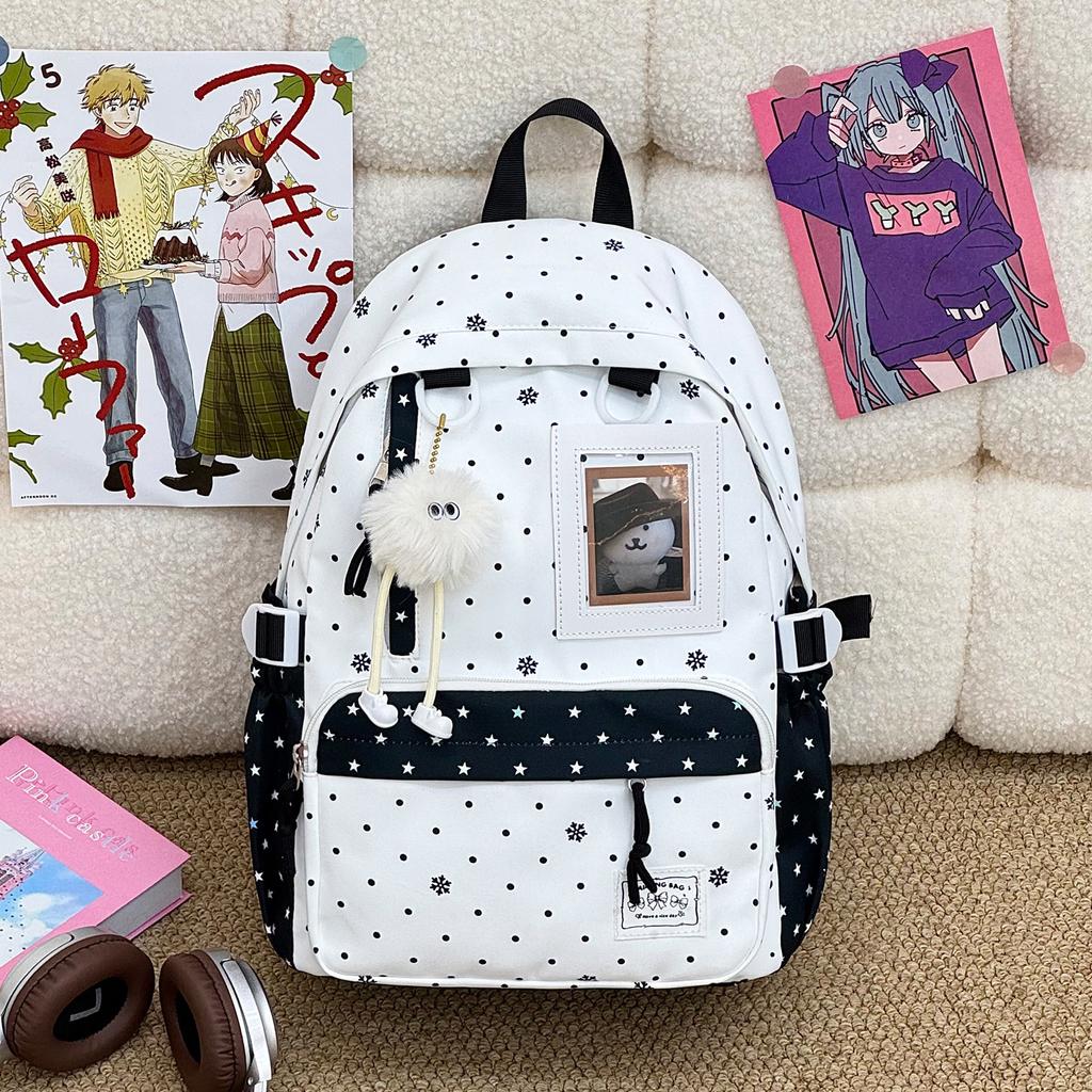 Schoolbag new high-value sweet and cute polka dot primary school backpack female volume two-dimensional transparent double shoulder pain bag