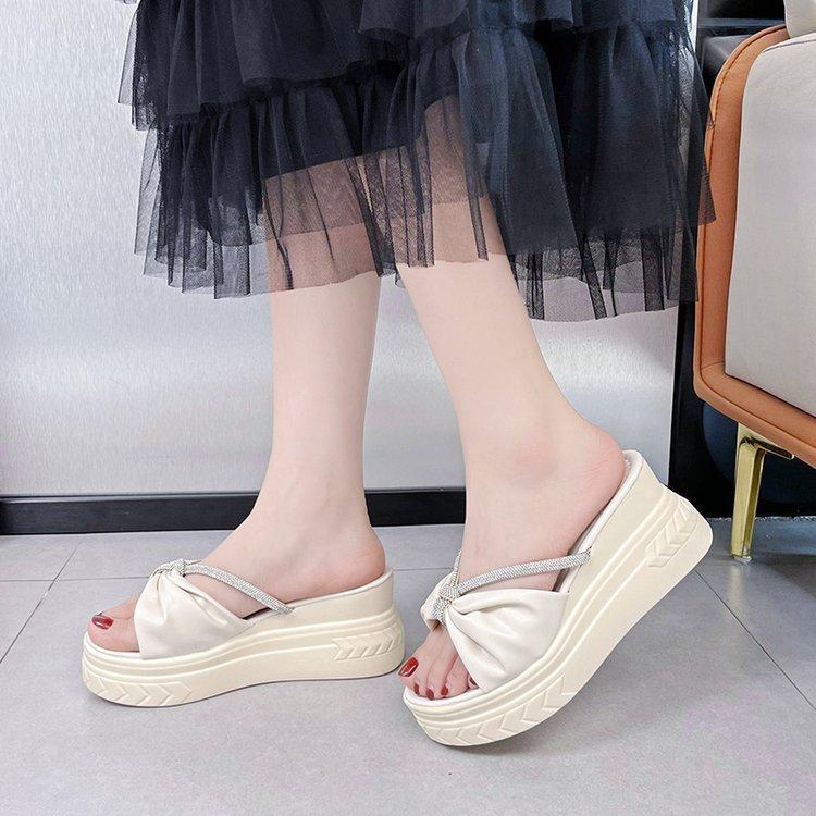 

Wedge heel slippers women s 2024 summer new simple word small large size rhinestone thick bottom high heel cool slippers 41