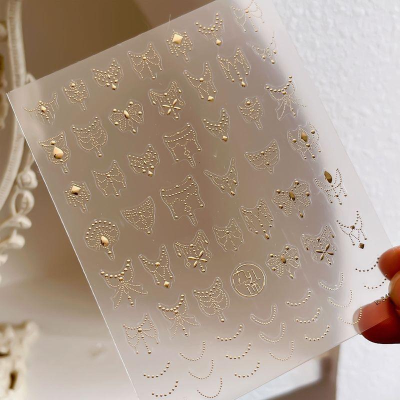

New Arrival Instafamous Pendant Relief Nail Sticker New Bronzing Adhesive Dot Line Butterfly Black and White Lace Nail Sticker A little butterfly sticker-gold TO3457