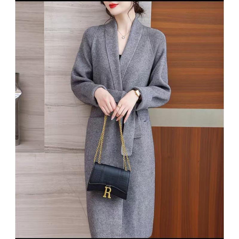 

Autumn and winter new long strappy sweater coat intellectual temperament loose large size knitted cardigan One size