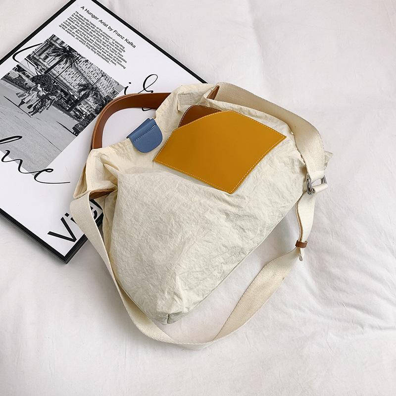 ins niche design splicing canvas bag Korean version women's shoulder bag commuter tote bag versatile casual messenger bag