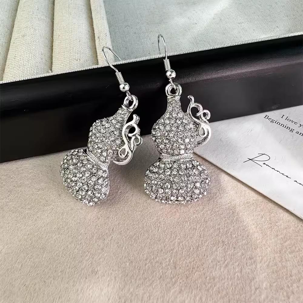 

Серьги из тыквы с цирконием, новые высококачественные темпераментные микро-инкрустированные женские персонализированные серьги, трендовые ювелирные изделия