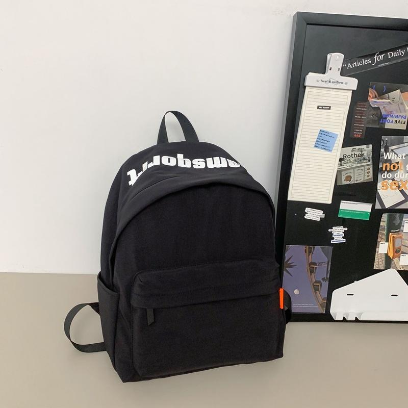 Backpack male college student fashion large-capacity schoolbag female high school student travel lightweight large-capacity computer backpack tide