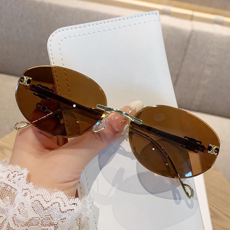 Oval Frame Metal Frameless Uv400 Sunglasses Trendy And High-End Retro Fashion Sun Protection Uv Resistant Glasses For Women