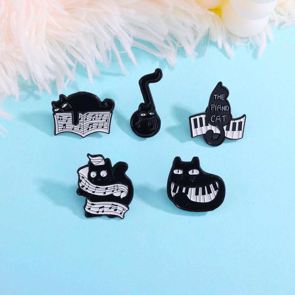 Creative Black Cat Keyboard Brooch: Cartoon Cat Playing Music with Wagging Tail