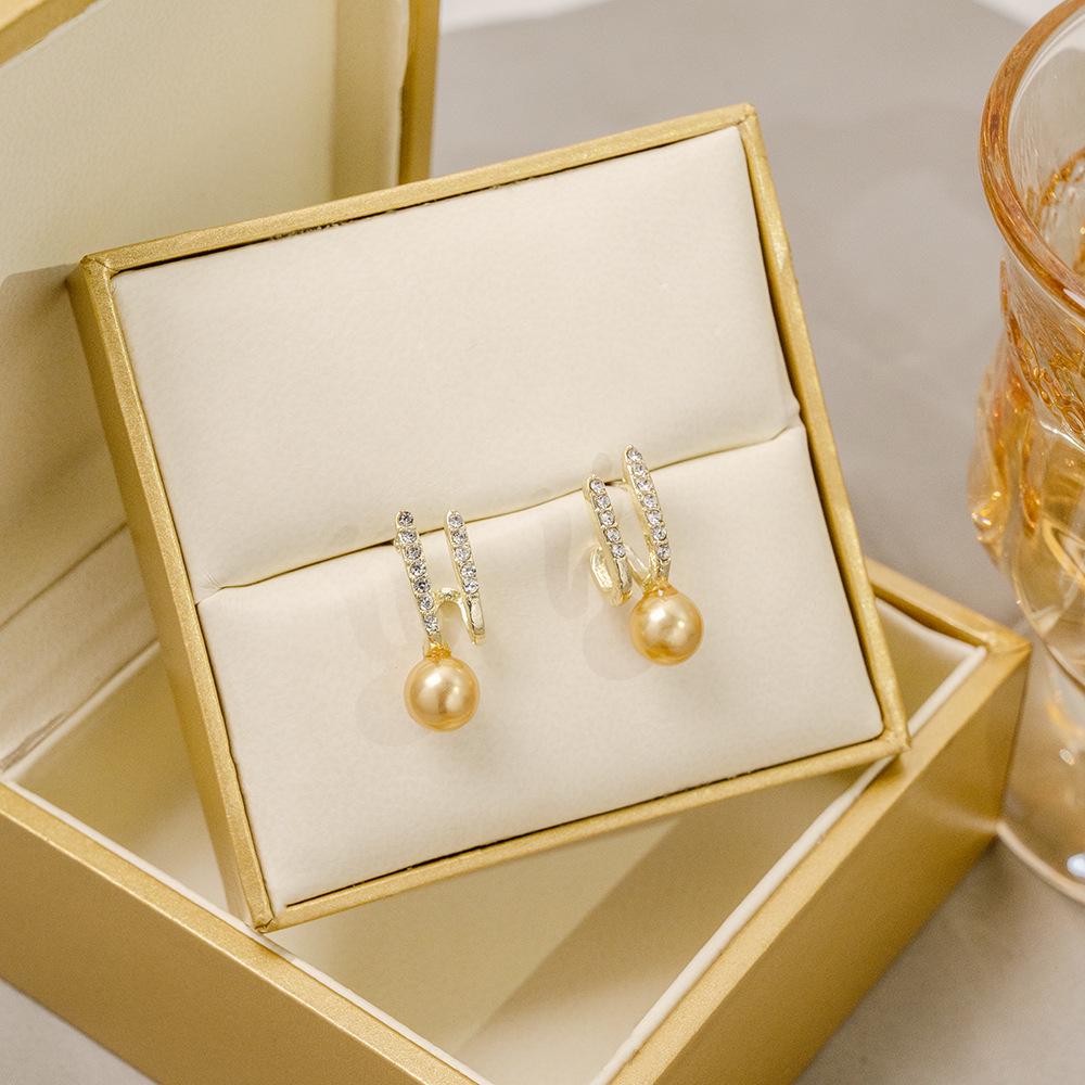

Champagne Pearl Rhinestone Stud Earrings - Elegant and Exquisite Korean-French Style