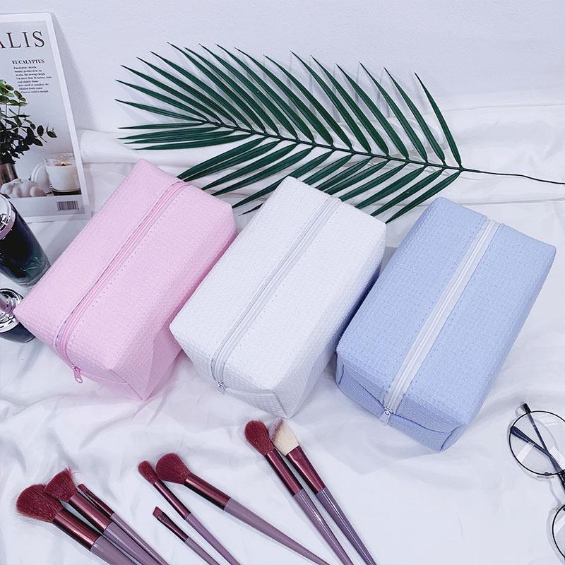 Trending Waffle Cosmetic Bag: Solid Color, Spacious, Women's Handheld Toiletry Organizer