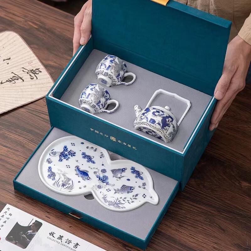 Cha Xun High-end Ceramic Tea Set with Cloisonne Silver Accents