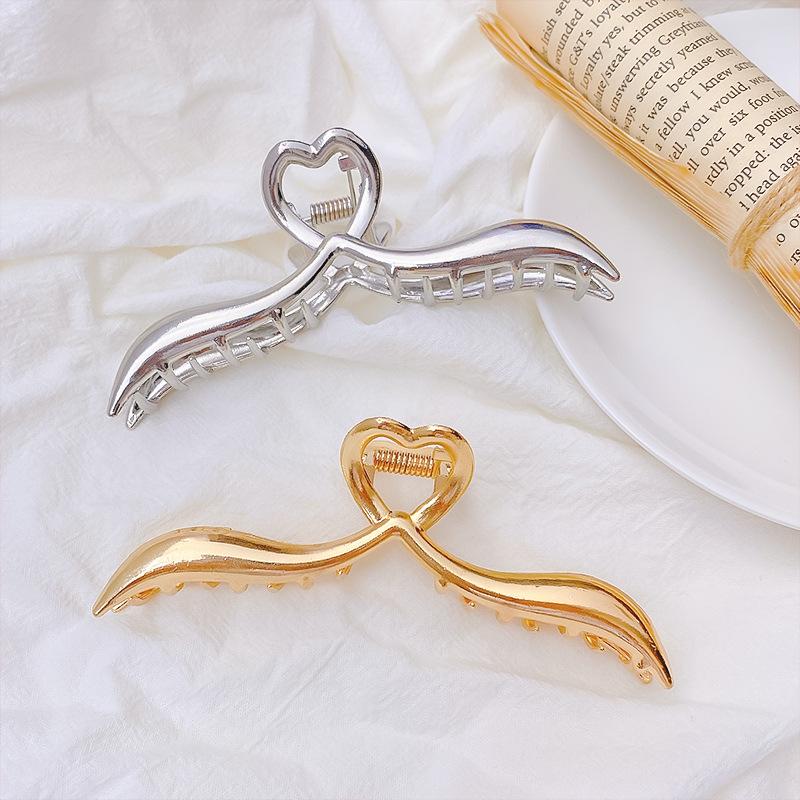 Pinces à cheveux creuses en métal pour femmes et filles, pinces à cheveux en forme de cœur irrégulier, accessoires de fête tendance, couvre-chef à breloques