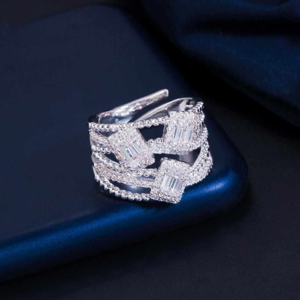 

Атмосферное кольцо с открытой шинкой, инкрустированное бриллиантами, микро-инкрустация цирконами, полое кольцо, ручное ювелирное изделие белого золота