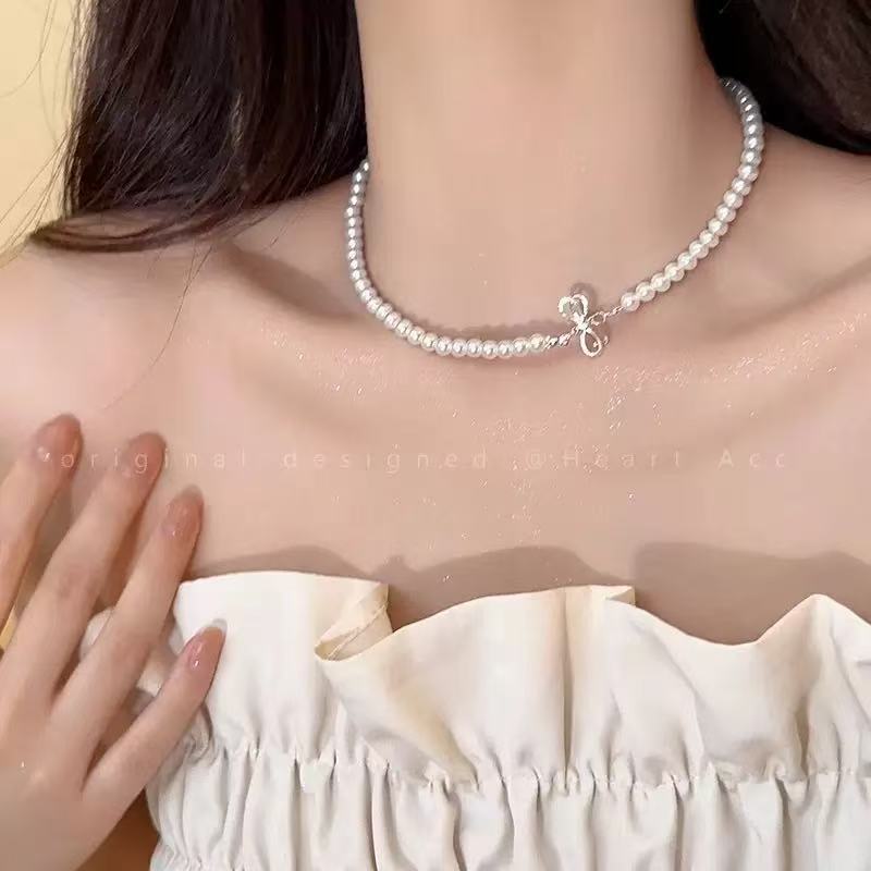 

Summer new mermaid tail collarbone necklace women s light luxury niche design sense simple pearl neck chain