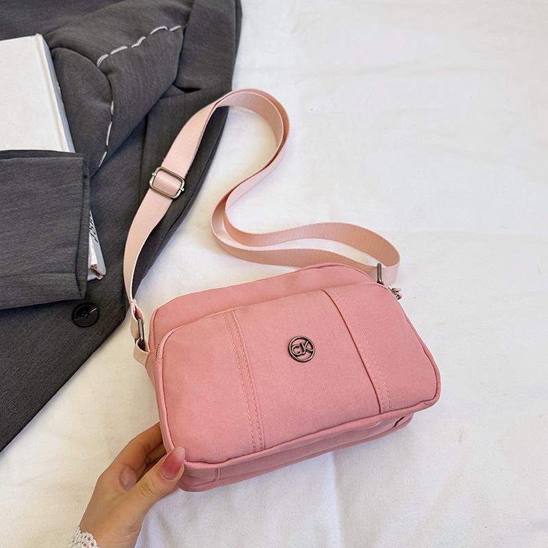 

2025 Универсальная Легкая Нейлоновая Сумка Кроссбоди через Плечо для Леди и Мам 20*7*15 cm розовый