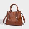 Guangzhou women's bucket bag 2026 new fashion versatile large-capacity commuter bag niche single-shoulder crossbody tote bag