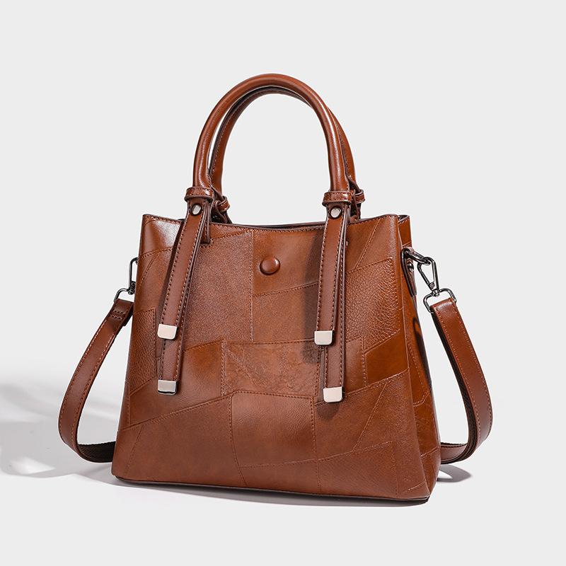 Guangzhou women's bucket bag 2026 new fashion versatile large-capacity commuter bag niche single-shoulder crossbody tote bag