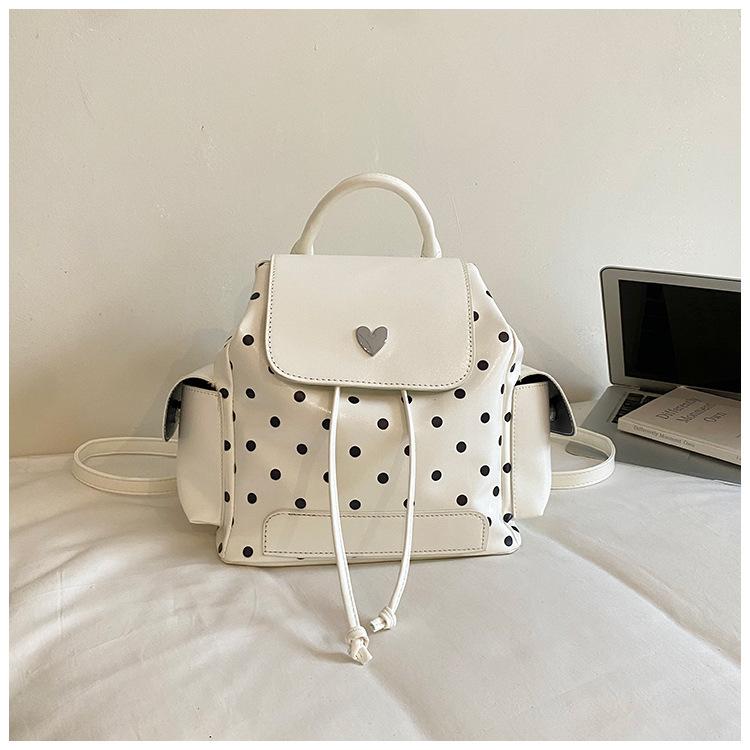 Schoolbag high value polka dot backpack 1011 summer new large capacity junior high school student schoolbag college student commuter backpack