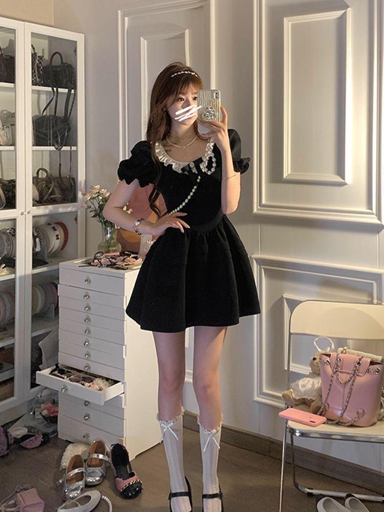 French high-end Hepburn style daughter feeling small black dress women's summer niche square neck bow bubble sleeve dress