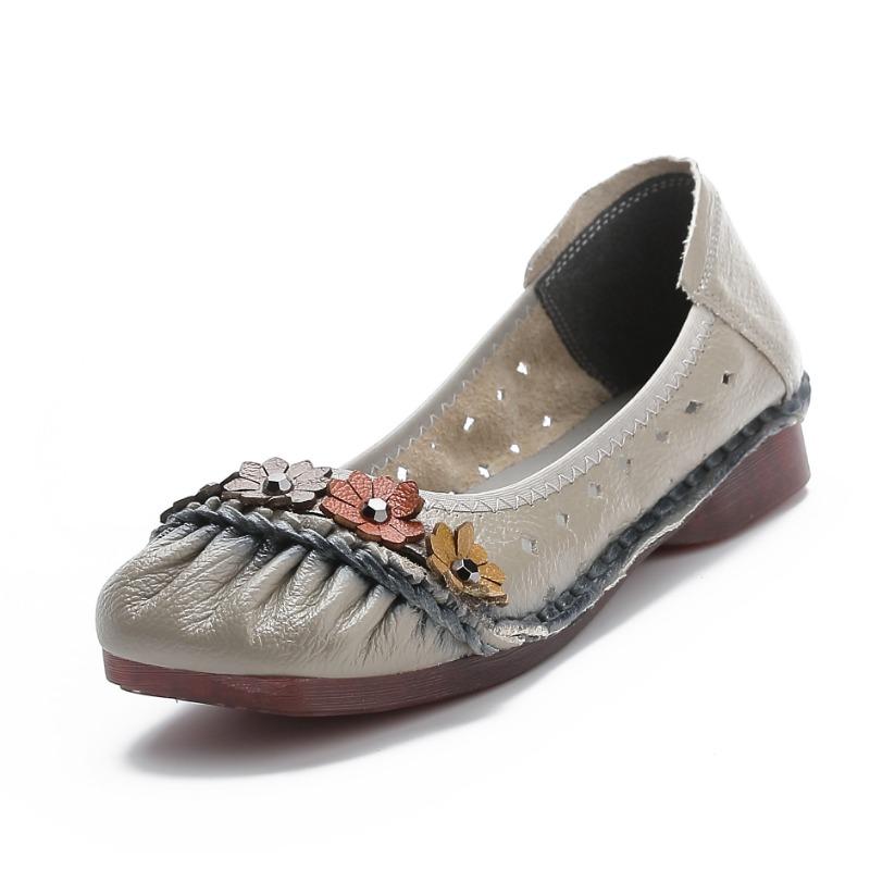 Summer new casual flat-bottomed breathable women's shoes leather hollow single shoes women's hole shoes soft sole