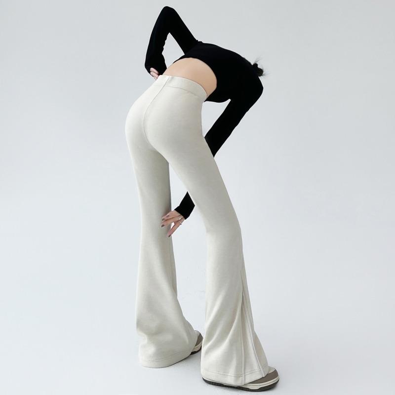 Jesienna Moda Damska Rozszerzane Długie Spodnie 2024 Nowe Elastyczne z Wysokim Stanem Casualowe Dopasowane Spodnie na Zamek Damskie Jednokolorowe Eleganckie Spodnie 2387