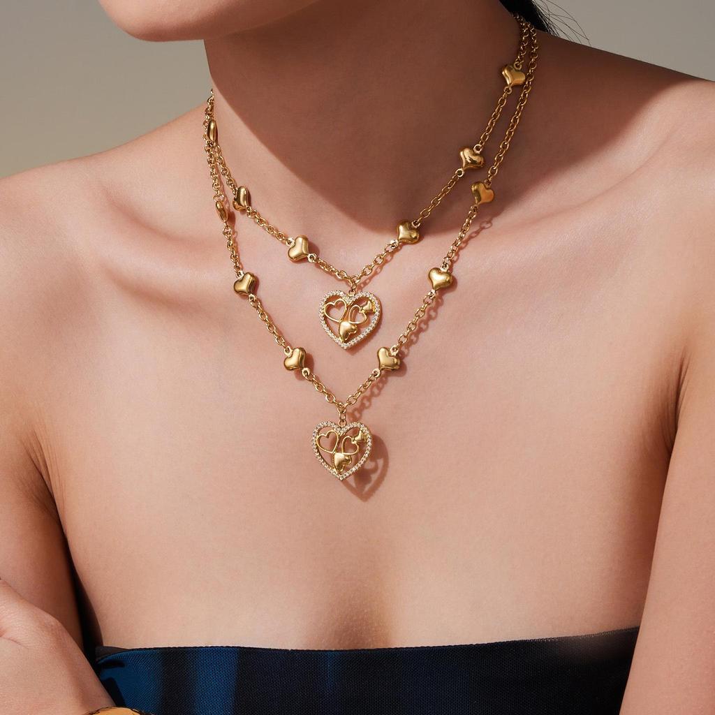 Qiong Yao 5A Zircon Heart Pendant Necklace with Diamond Accents, 18K Gold-Plated Stainless Steel.