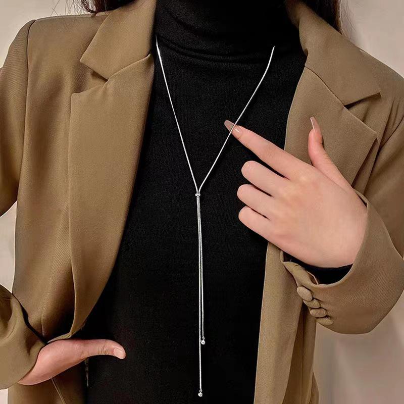 Korean Style Pearl Tassel Necklace: Versatile, Fashionable Long Pendant for Women's Summer Sweaters.