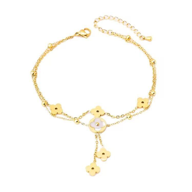 

Сладкая титановая стальная цепочка на ногу с счастливой травой, ювелирное изделие, двухслойная цепочка на ноги с кисточками и цветком золотой