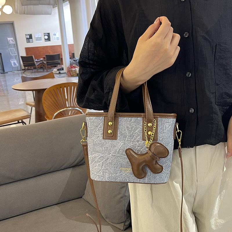 Simple Handbag Bag Women's High-end Sense Versatile Single Shoulder Oblique Span Bag Niche Design Commuter Bucket Bag