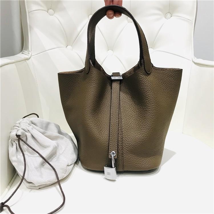 2023 Nowa damska torba ze skóry bydlęcej pierwszej jakości, wzór liczi, koszyk warzywny, worek typu bucket bag, modna i prosta, codzienna torebka