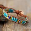 Bohemian Turquoise Bracelet, Handcrafted with Woven Leather Cord, a Cultural and Travel-themed Friendship Accessory.
