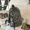 Leopard Print Backpack Casual Daily Use Trendy Street Style Lightweight Backpack for Women with Tassel Detail for School Travel and Everyday Outings