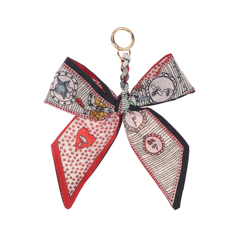 Porte-clés nœud papillon ruban élégant coréen écharpe en soie douce porte-clés porte-clés de voiture breloques de sac pour femmes accessoires de clés pour cadeaux de fille
