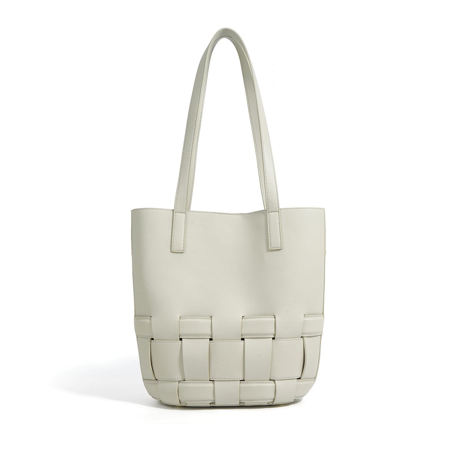 

New niche woven cowhide tote bag fashionable hollow handbag large capacity new casual shoulder armpit bag