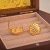Retro Wavy Pattern Round Stud Earrings with Smooth Surface and S925 Silver Needle for Women.