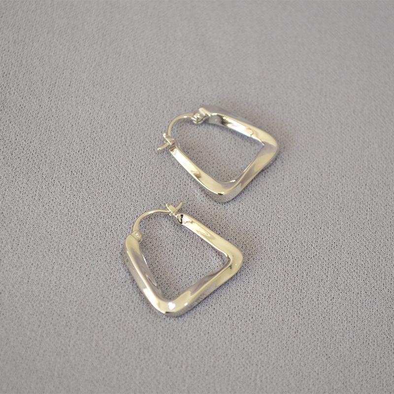 INS Geometric Twisted Metal Triangle Earrings for Women.