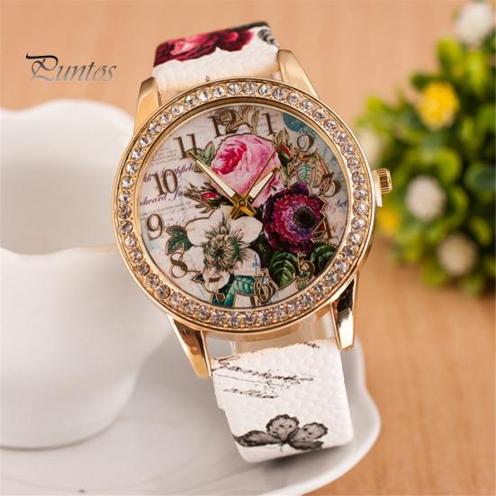 Orologio da polso da donna al quarzo con quadrante rotondo intarsiato di strass a forma di fiore e cinturino in ecopelle