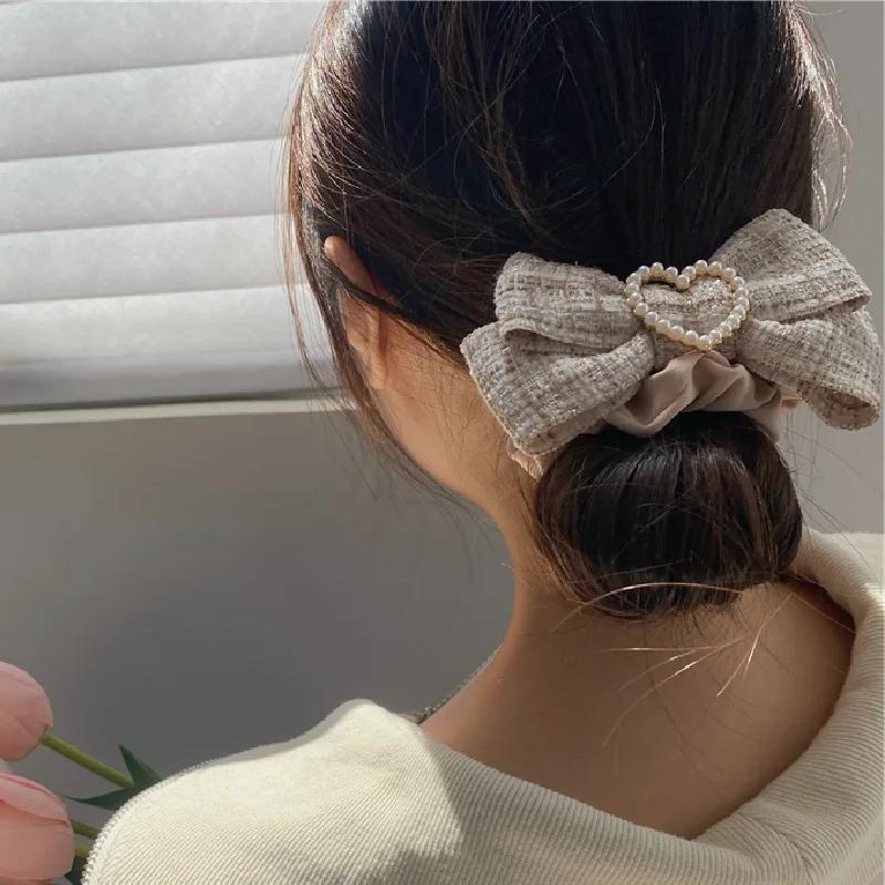 Neues Schleifen-Haarseil Ringe Damen Süße Perle Herz Haargummis Elastisches Stirnband Mädchen Haaraccessoires Pferdeschwanzhalter Bänder