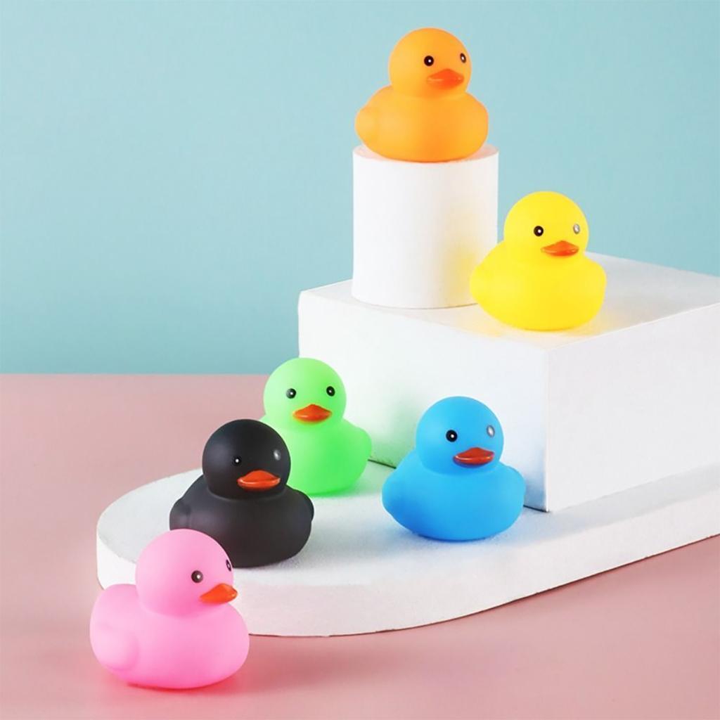 1 random colored mini pet sound toy in the shape of a duckling, squeaking sound