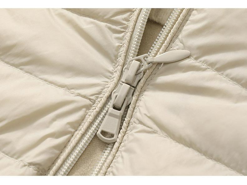 Damen Schlankmachende Leichte Daunenweste, Mittellange Sportjacke & Mütze für Herbst/Winter - Übergröße Verfügbar