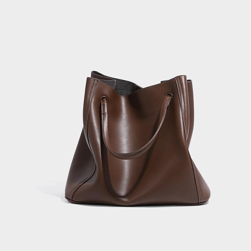 Soft Leather Bucket Bag 2024 Spring Summer New Women s Soft Leather Crossbody Commuter Large Capacity Tote Bag Niche Design Bag