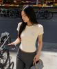Lomaentinueo Sunrise Slim-Fit Cropped Cotton T-Shirt (Cream)