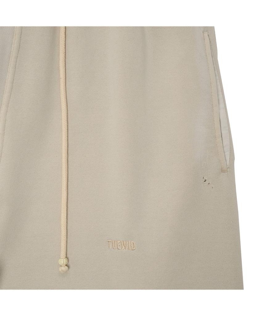 TUEWID Tuewid Classic Embroidery Sweatpants In Raw Edge Lounge Fit (Eggshell)