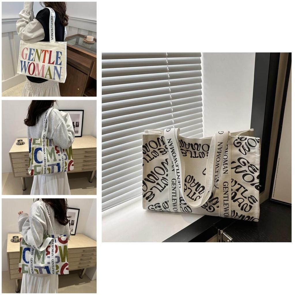 Large Capacity Stylish Canvas Tote Bag With Vibrant Letter Print Design For Everyday Use